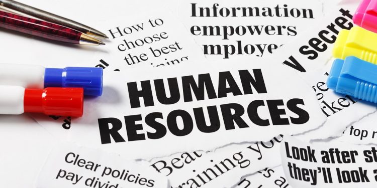 Хората и тяхното развитие във фокуса: тенденции в HR 1 Headlines on Human Resources and employment issues, with pens